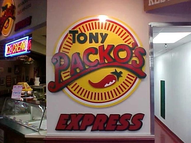 Tony Packos sign cut out of wood, shaped and enamel coated. These are installed at the Andersons in Maumee, Ohio.
