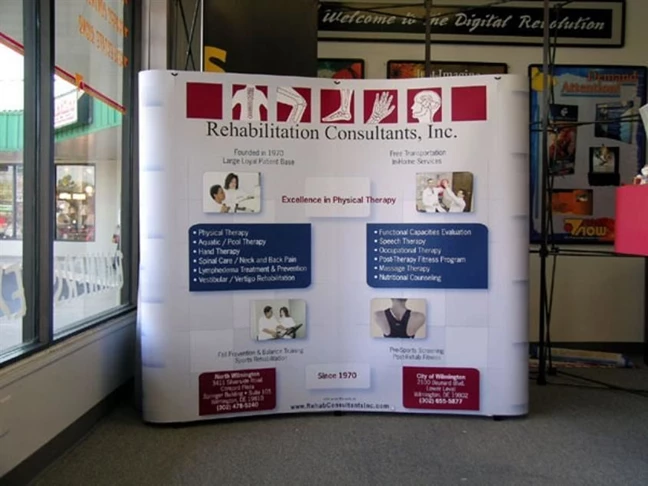 Fully magnetic popup display system with velcro receptive fabric backwall